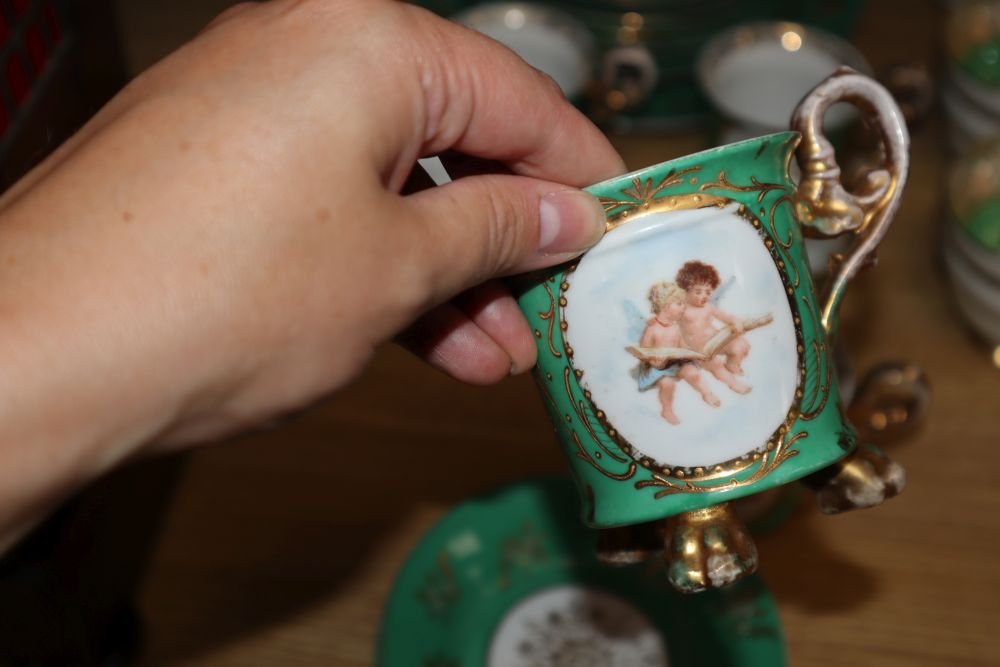 A Paragon china green and gilt part tea set and a Continental part tea set, decorated with printed reserves